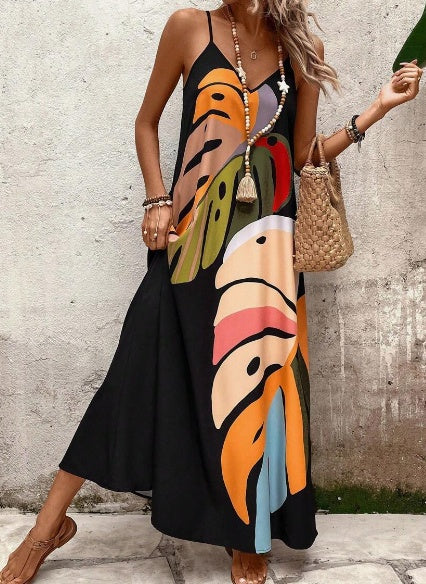 Joy – Modieuze Jurk met Kleurvolle Bladerenprint en Bandjes