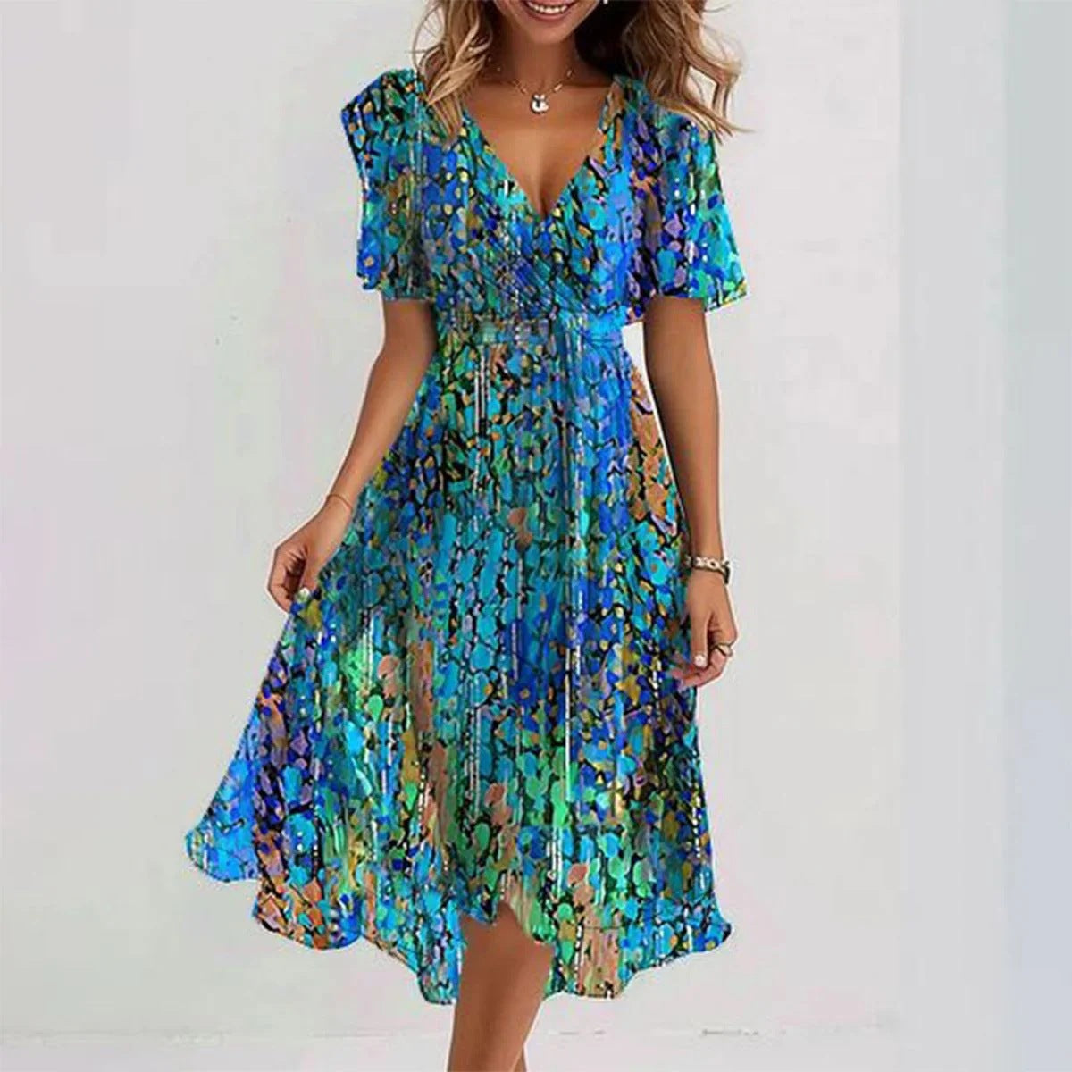Dames wikkeljurk met bloemendessin en elegante chiffonlook