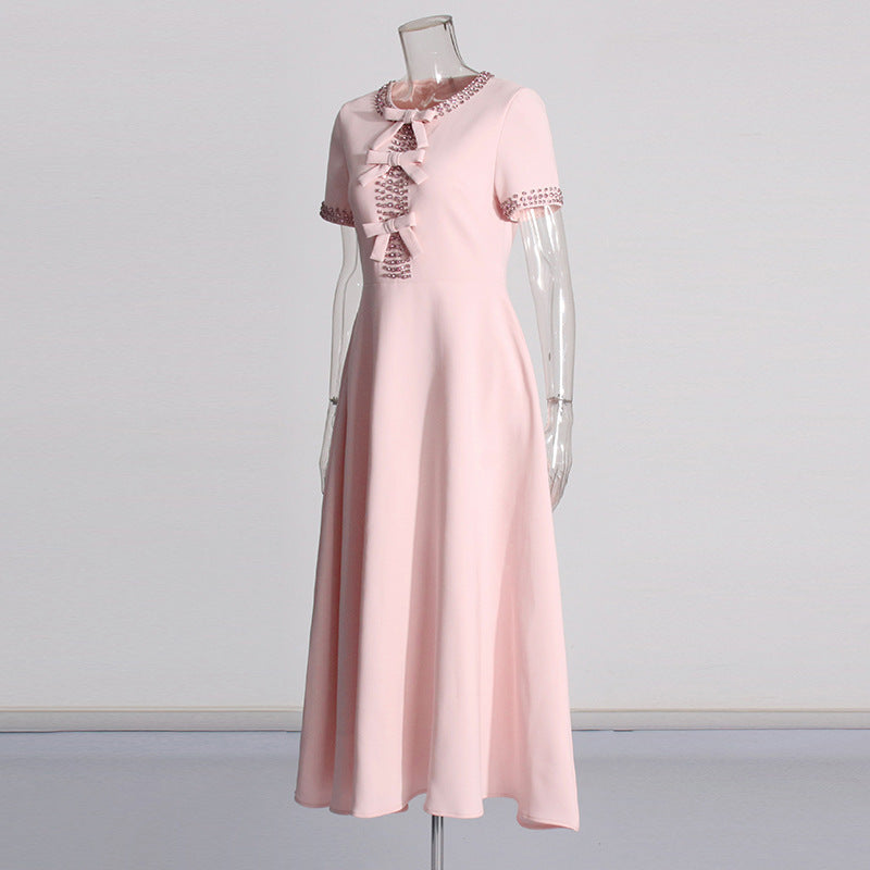 Georgina – Luxe Jurk met Strik en Rhinestone