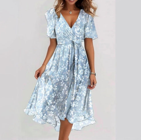 Dames wikkeljurk met bloemendessin en elegante chiffonlook