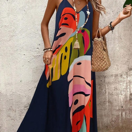 Joy – Modieuze Jurk met Kleurvolle Bladerenprint en Bandjes