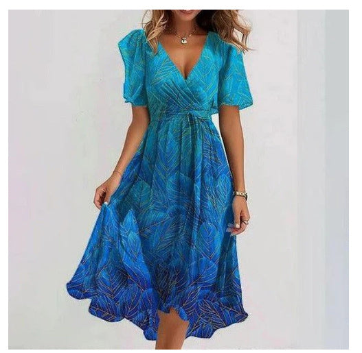 Dames wikkeljurk met bloemendessin en elegante chiffonlook